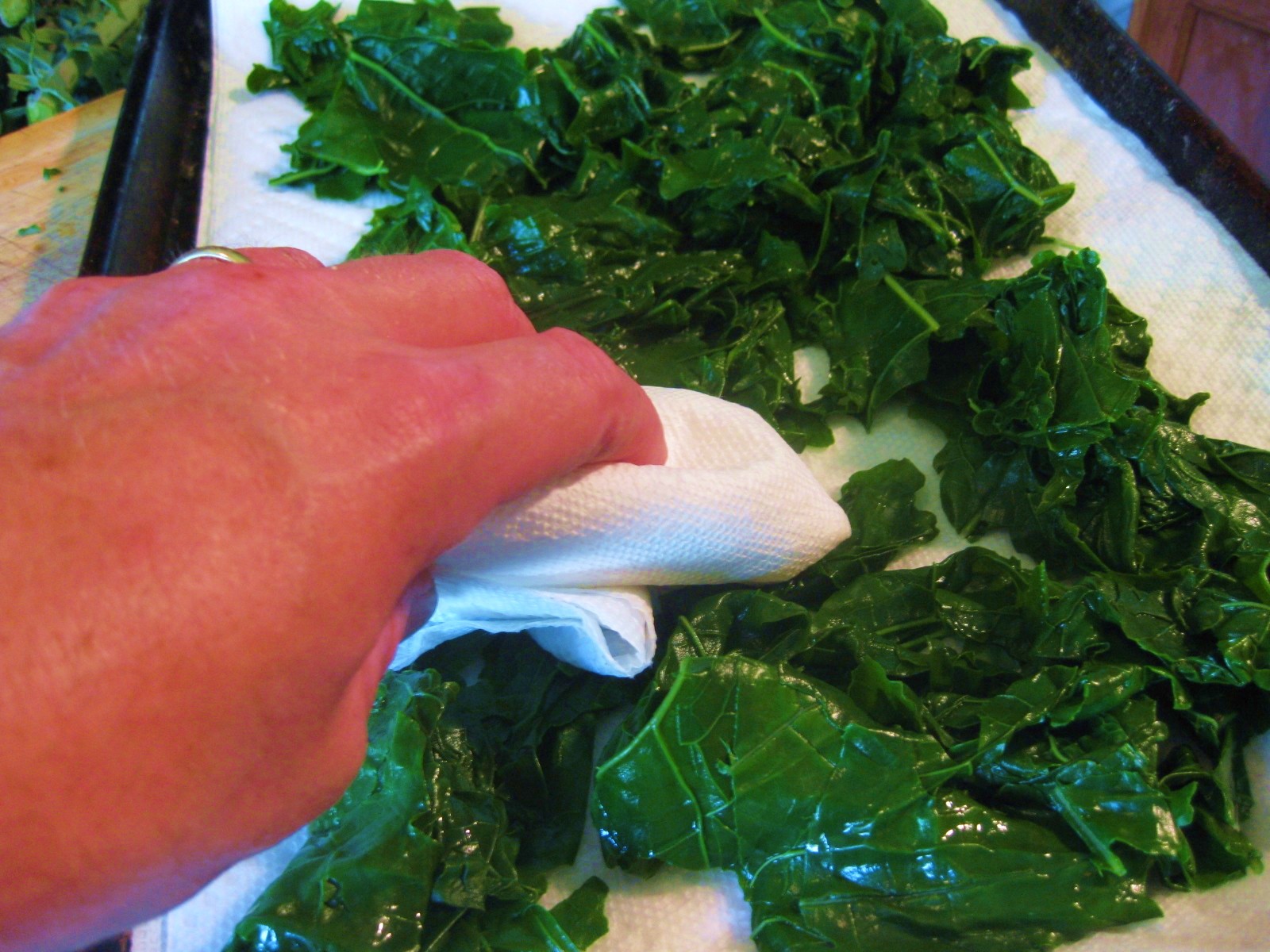 Chilling. Using tongs or a slotted spoon, transfer the greens to a big ...