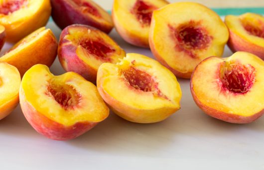 halved and pitted peaches for Rustic Peach Galette