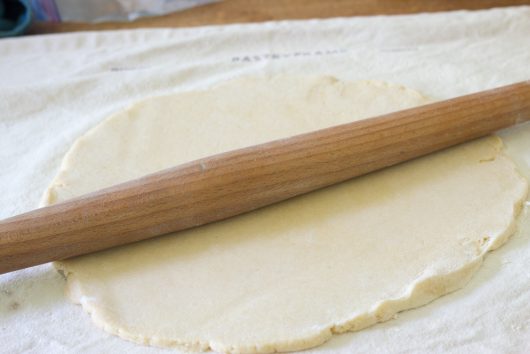 rolling out the dough for Rustic Peach Galette