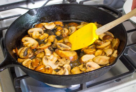 saute the mushrooms for Skillet Steak Dinner Recipe